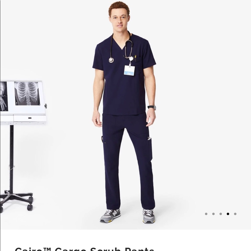 Figs double pocket scrub top size medium ( PRICE IS FIRM)